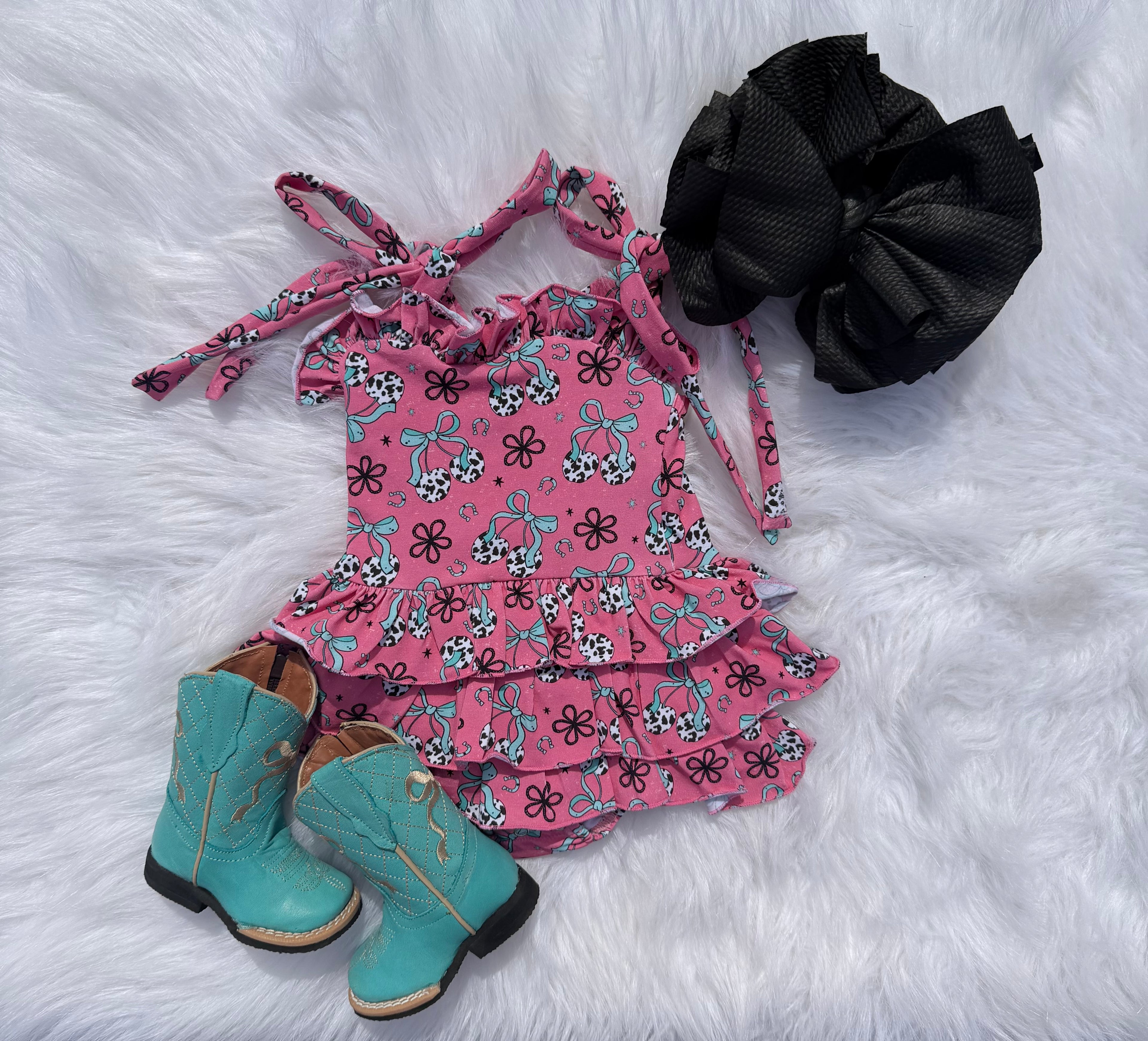 Cow print cherry ruffle romper