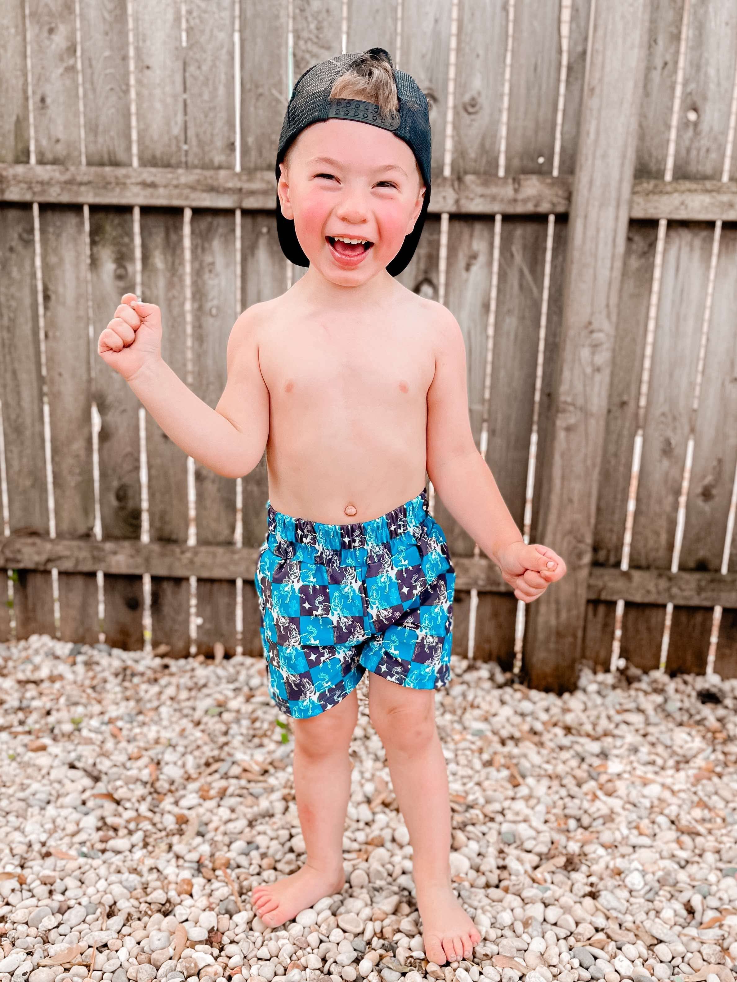 Teal Buckin’ Broncs Swim Trunks (FINAL SALE)