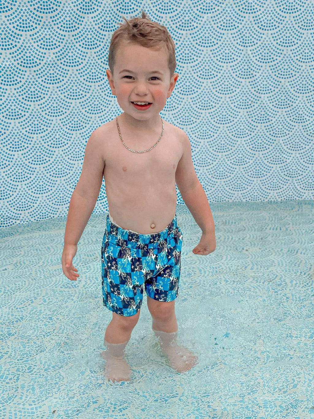 Teal Buckin’ Broncs Swim Trunks (FINAL SALE)