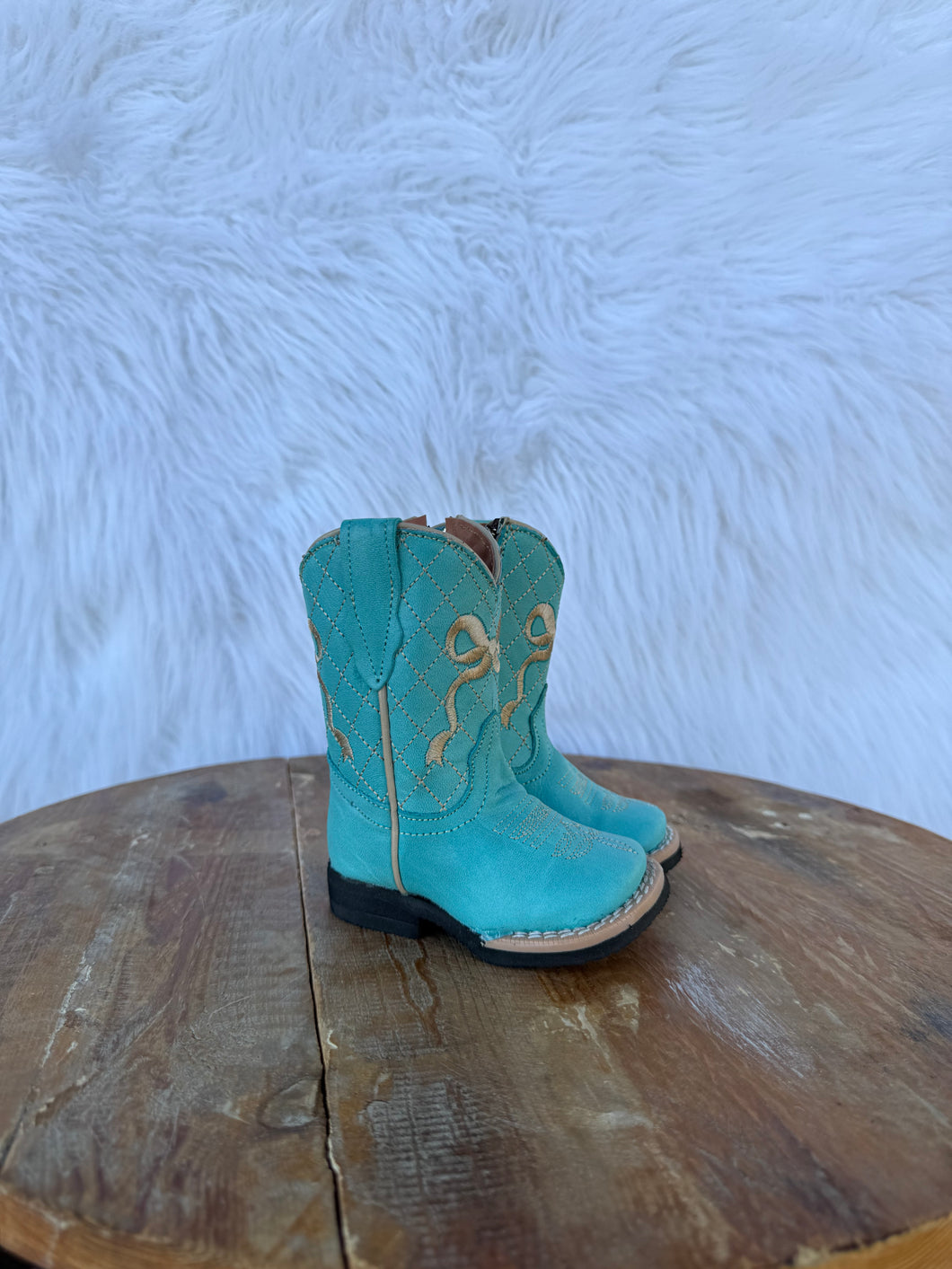 Turquoise Bow Tanner Mark Boots