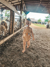 Load image into Gallery viewer, Cow Smocked Suspender Bubble Romper
