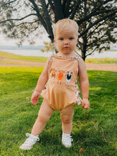 Load image into Gallery viewer, Cow Smocked Suspender Bubble Romper
