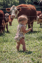 Load image into Gallery viewer, Cow Smocked Suspender Bubble Romper
