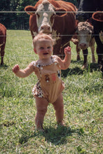 Load image into Gallery viewer, Cow Smocked Suspender Bubble Romper
