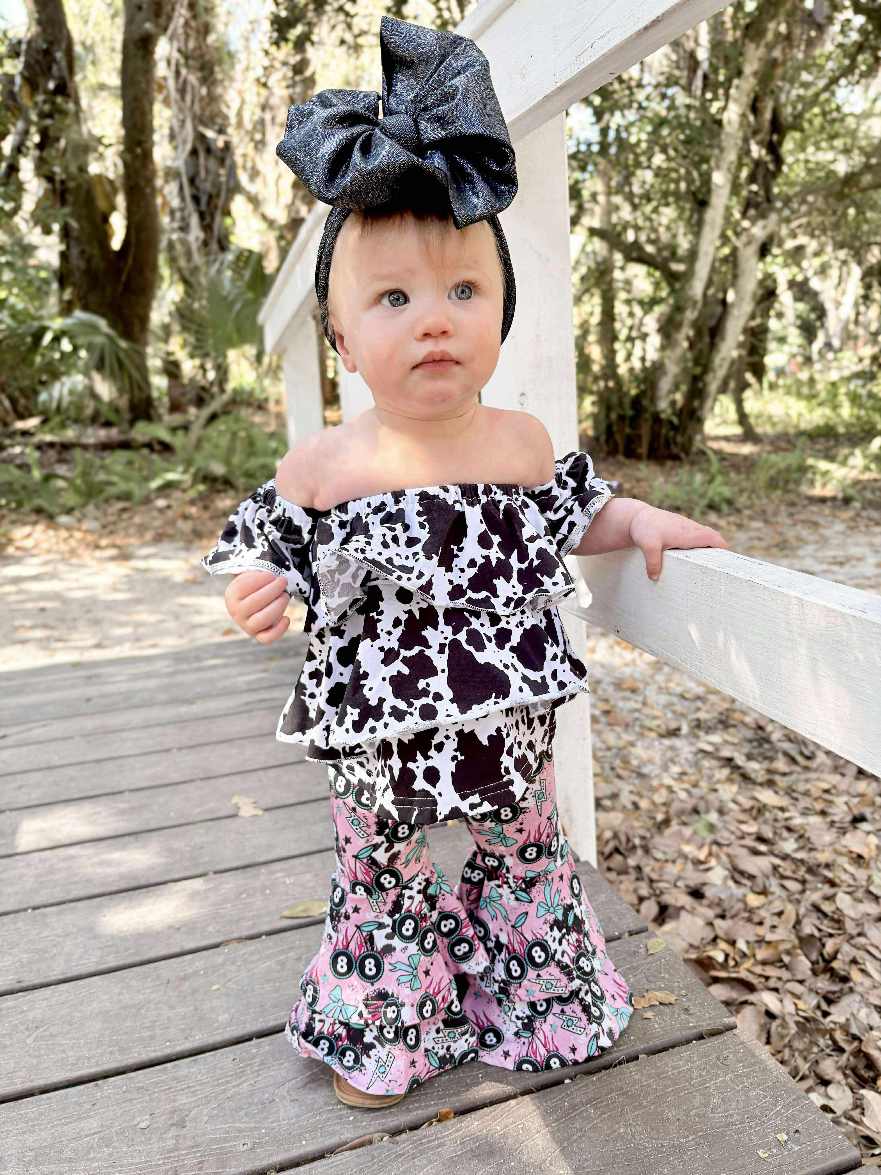 Cow print ruffle top