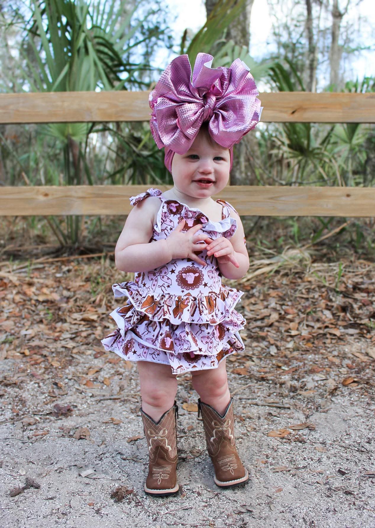 Pink cows ruffle romper