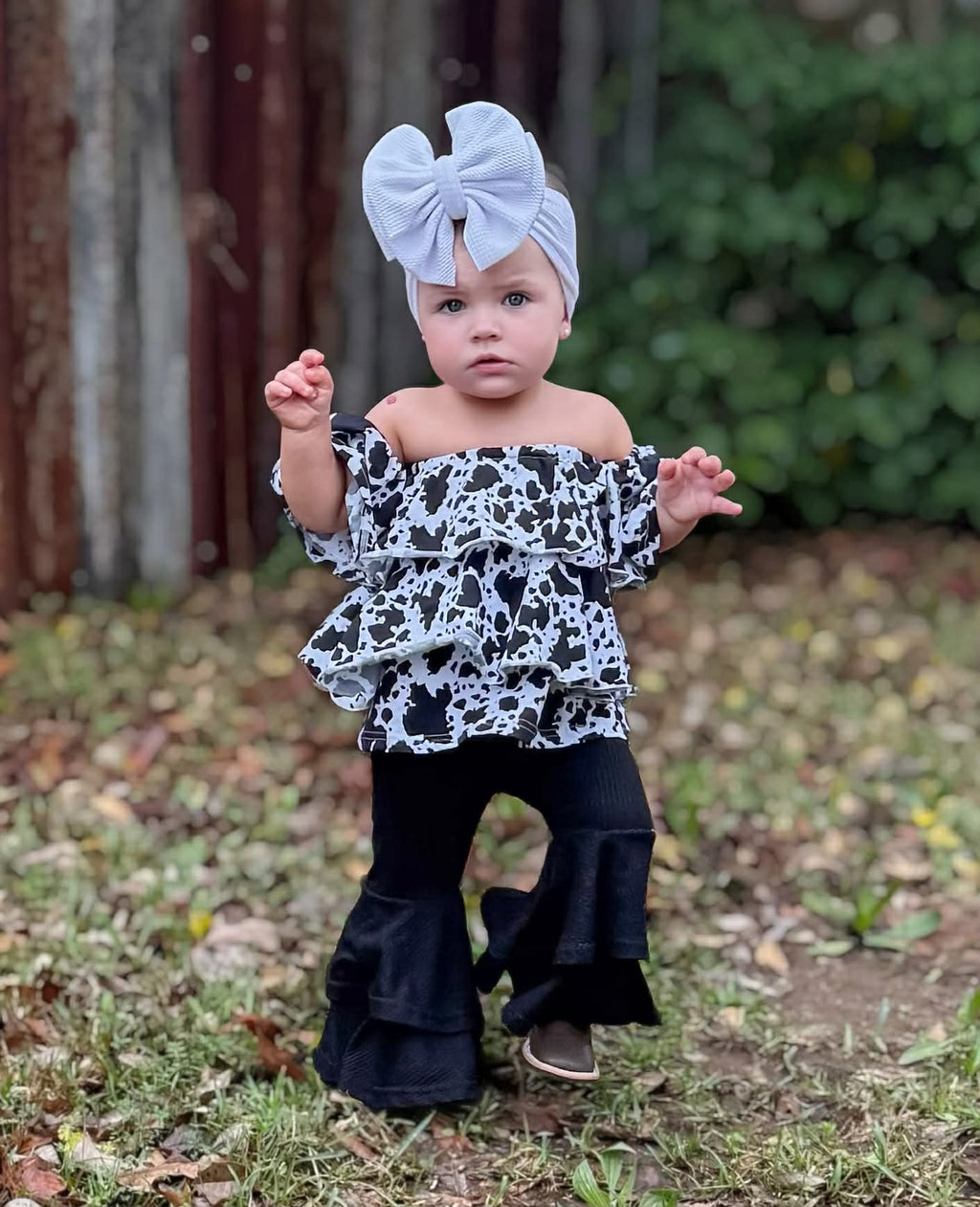 Cow print ruffle top