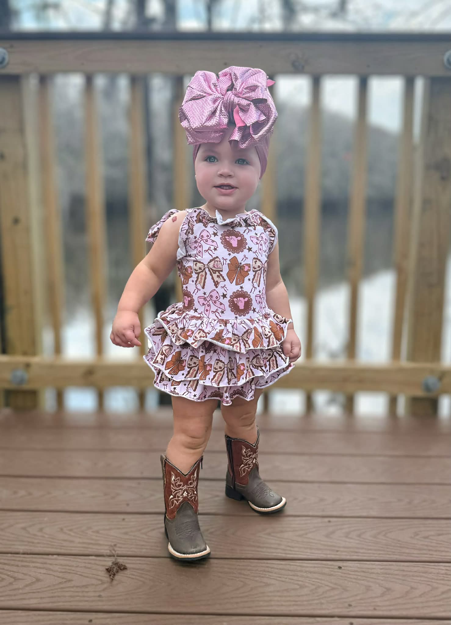 Pink cows ruffle romper