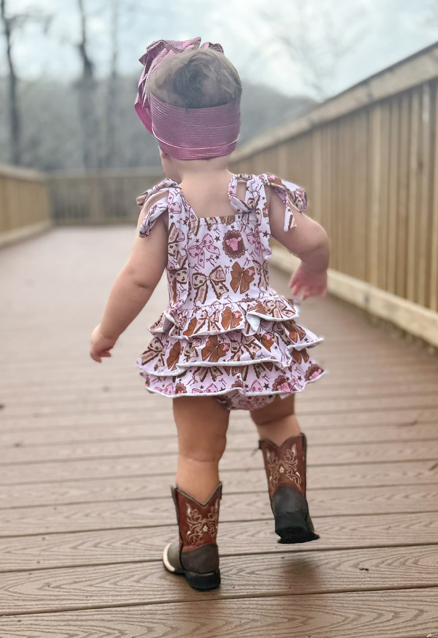 Pink cows ruffle romper