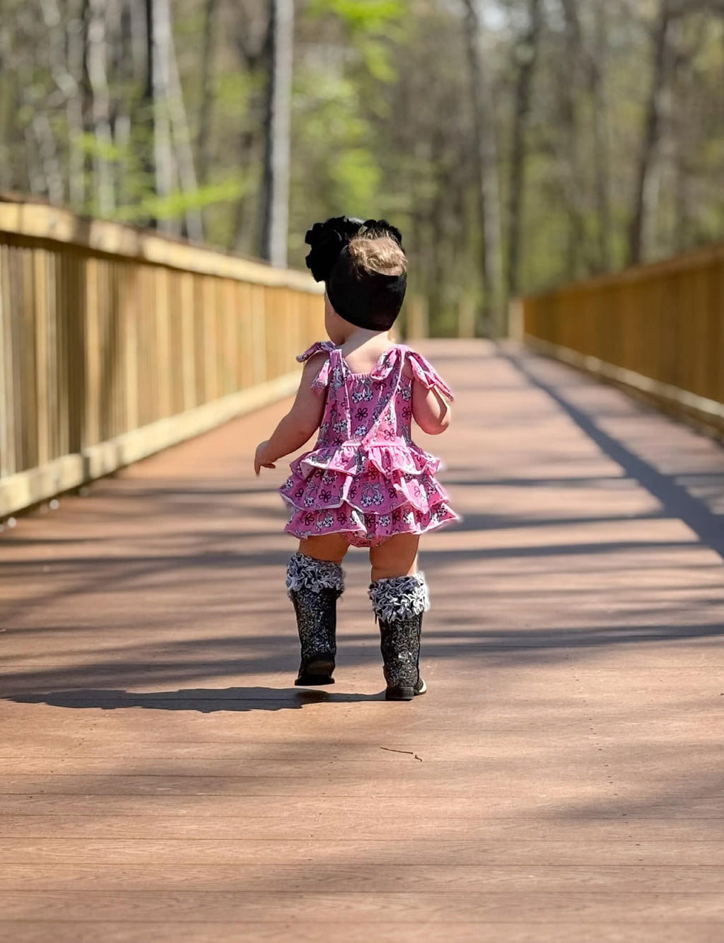 Cow print cherry ruffle romper