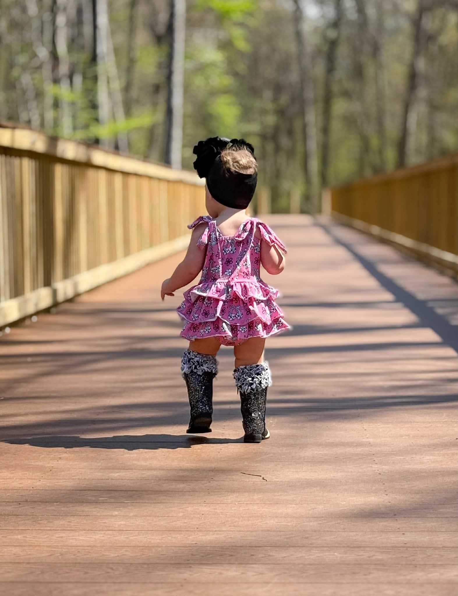 Cow print cherry ruffle romper
