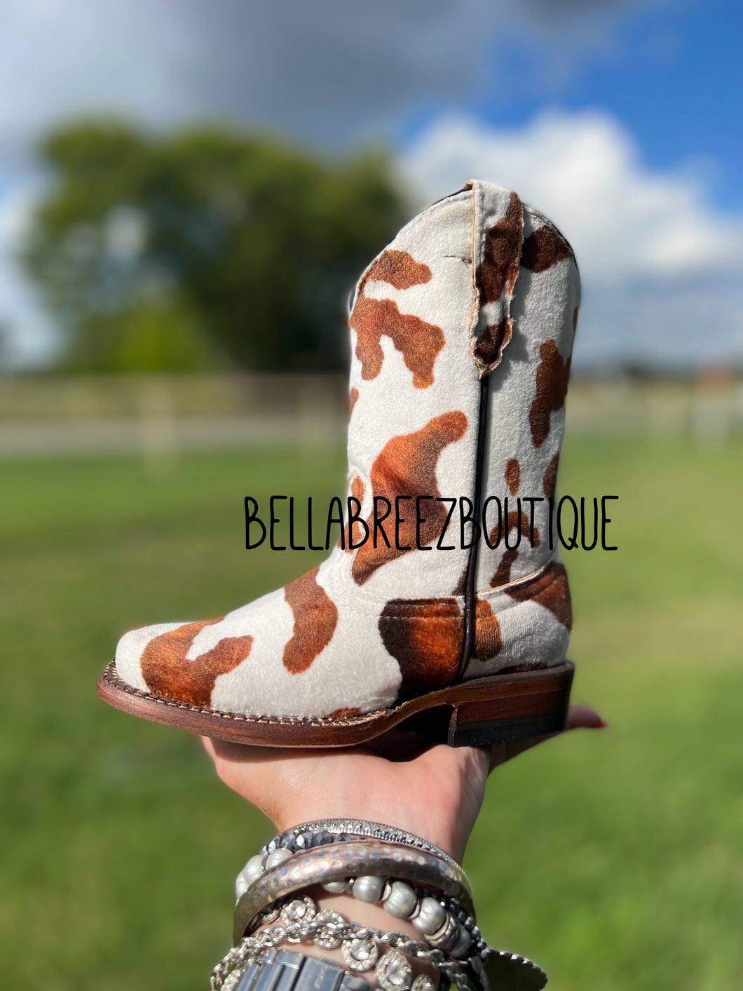 Brown & White Cow Print Tanner Mark Boots